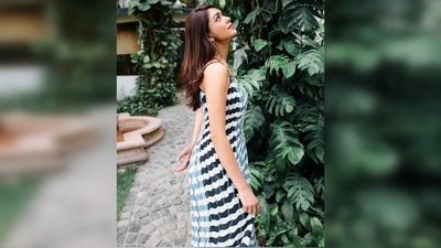 Mrunal Thakur treated her fans with beautiful pictures of herself in this flowy dress featuring double straps and stripes. (Instagram/@mrunalthakur) Mrunal Thakur treated her fans with beautiful pictures of herself in this flowy dress featuring double straps and stripes. (Instagram/@mrunalthakur)