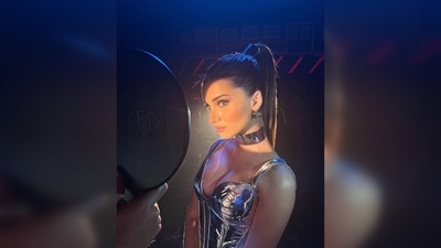 Tara Sutaria teamed her look with a pair of thigh-high custom made silver metallic boots. (Instagram/@spacemuffic27) Tara Sutaria teamed her look with a pair of thigh-high custom made silver metallic boots. (Instagram/@spacemuffic27)