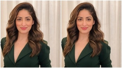 Yami teamed a blazer-cut green top with pleat details around the waist with a pair of green trousers with wide legs. (Instagram/@yamigautam)