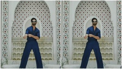 Against a white backdrop decorated in floral motifs, Shahid posed like a fashion icon. (Instagram/@shahidkapoor)