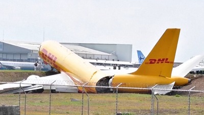 Smoke was billowing from the bright yellow plane of German logistics giant DHL as it ground to a halt. (AFP)