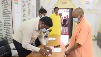 UP CM Yogi Adityanath at polling booth to cast his vote for MLC elections. UP CM Yogi Adityanath at polling booth to cast his vote for MLC elections.
