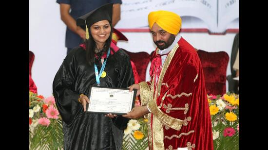 CM Bhagwant Mann confers degree to a student during the 1st convocation of the Maharaja Ranjit Singh Punjab Technical University in Bathinda on Saturday. (Sanjeev Kumar/HT)