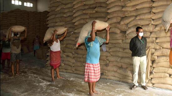 After winning the sarpanch election in February this year, Banamali Naik, sarpanch of Dhumabhata gram panchayat under Bolangir’s Belapada block started delivering rice and wheat at doorstep of people. (HT PHOTO.)
