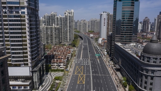 Nearly-empty roads during a lockdown due to Covid-19 in Shanghai, China, on Saturday, April 9, 2022. Shanghai Deputy Mayor Zong Ming announced tweaks to the government's lockdown policy at a press briefing, Saturday, yet overall measures remained stringent as residents living in communities with Covid cases in the past seven days are barred from leaving their homes.&nbsp;(Photographer: Qilai Shen/Bloomberg)