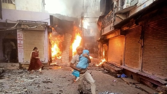 At least 35 people were injured in clashes in Karauli, in Rajasthan, on Saturday.