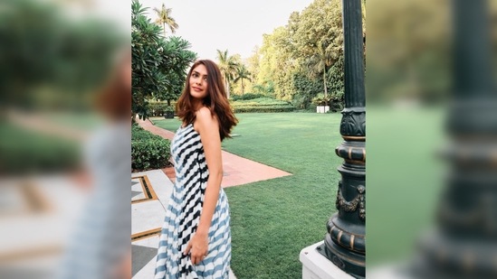 Mrunal Thakur also shared a video where she can be seen walking around a park trwirling and flaunting her outfit.(Instagram/@mrunalthakur)