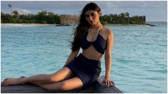 Actor Mouni Roy is all of us come summer, and her new post is proof. With the arrival of the summer season, we are all craving a vacation. And the Brahmastra star also feels the same. She took to her Instagram profile today to post several throwback pictures from her Maldives holiday last year, and they are all about beach babe vibes. She even captioned them, “#takemeback.” Scroll ahead to see them all. Fair warning: they will give you major wanderlust.(Instagram/@imouniroy)