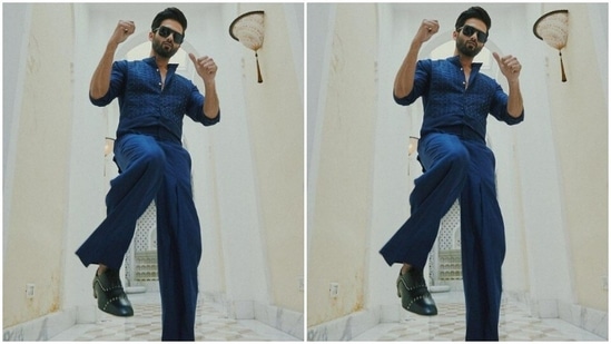 Shahid paired an embroidered short kurta with a pair of trousers with wide legs. Shahid’s kurta came intricately embroidered in blue and silver resham threads.(Instagram/@shahidkapoor)