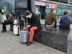 Holidaymakers and travellers sit outside the Covid-19 Test centre at Terminal 3 of London Heathrow Airport in West London. Staff shortages due to the Covid-19 pandemic continue to disrupt the aviation industry. Holidaymakers and travellers sit outside the Covid-19 Test centre at Terminal 3 of London Heathrow Airport in West London. Staff shortages due to the Covid-19 pandemic continue to disrupt the aviation industry. 