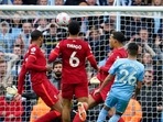 Manchester City's Riyad Mahrez, right, kicks the ball during the English Premier League soccer match between Manchester City and Liverpool, at the Etihad stadium in Manchester. Manchester City's Riyad Mahrez, right, kicks the ball during the English Premier League soccer match between Manchester City and Liverpool, at the Etihad stadium in Manchester.