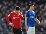 Manchester United's Cristiano Ronaldo reacts as Everton's Michael Keane looks on