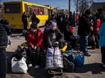 People wait for a bus to go in a train station in Severodonetsk, eastern Ukraine as they flee the city in the Donbas region. The United Nations estimates that 7.1 million people have been displaced within the country, according to figures published by the IOM on April 5.(Photo by FADEL SENNA / AFP) People wait for a bus to go in a train station in Severodonetsk, eastern Ukraine as they flee the city in the Donbas region. The United Nations estimates that 7.1 million people have been displaced within the country, according to figures published by the IOM on April 5.(Photo by FADEL SENNA / AFP)