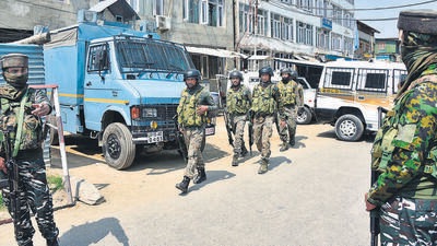 Security forces near the site of encounter in Bishamber Nagar area of Srinagar on Sunday. Security forces near the site of encounter in Bishamber Nagar area of Srinagar on Sunday.