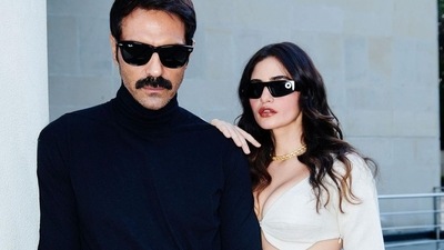 Taking to her social media handle, South African model and designer Gabriella Demetriades shared a slew of pictures with actor-boyfriend Arjun Rampal that showed them putting their sartorial foot forward in monochrome dressing.&nbsp; (Instagram/gabriellademetriades)