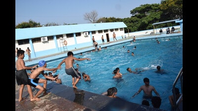 As the summer heat intensifies, children are seen flocking to the municipal swimming pool at Akurdi on Sunday. (HT PHOTO) As the summer heat intensifies, children are seen flocking to the municipal swimming pool at Akurdi on Sunday. (HT PHOTO)