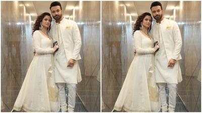 Ankita chose a white embroidered anarkali suit set for the photoshoot. The anarakli kurta features a wide U neckline, fitted bodice, a flared skirt, intricate coin embroidery, gota patti border on the hemline, printed full sleeves with patti-adorned cuffs, and an ankle-length hem. (Instagram/@lokhandeankita) Ankita chose a white embroidered anarkali suit set for the photoshoot. The anarakli kurta features a wide U neckline, fitted bodice, a flared skirt, intricate coin embroidery, gota patti border on the hemline, printed full sleeves with patti-adorned cuffs, and an ankle-length hem. (Instagram/@lokhandeankita)