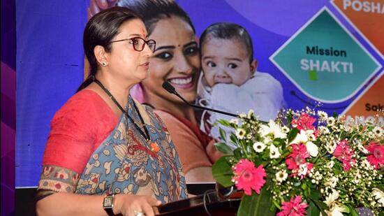 Union Minister Smriti Irani at an event in Guwahati on Sunday. She was en route to Guwahati, when she got involved in a verbal tiff with a Congress leader. (PTI PHOTO.)