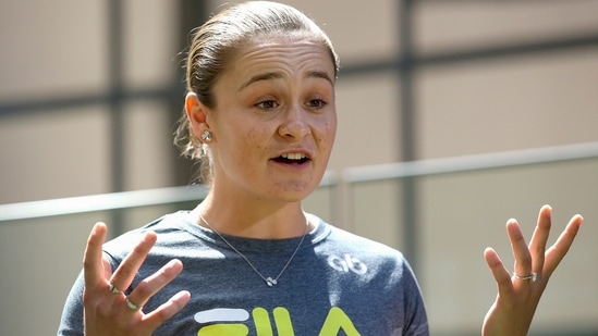 Ash Barty of Australia gestures during a press conference in Brisbane(AP)