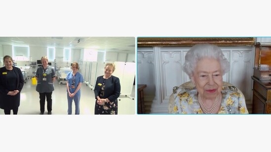 Britain's Queen Elizabeth II speaks to Lucie Butler, director of nursing and managing director of The Queen Elizabeth Unit; Nicola Rudkin, deputy associate director of nursing; Charlie Mort, junior sister and Jackie Sullivan during a video link call and virtual visit to the Royal London Hospital on Wednesday April 6, 2022, to mark the official opening of the hospital's Queen Elizabeth Unit. (Buckingham Palace via AP)(AP)