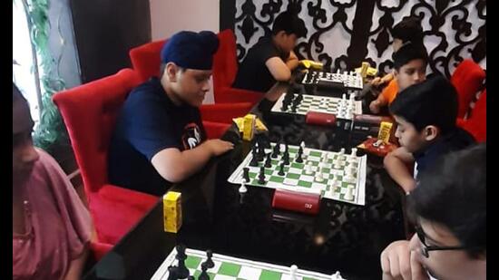 Chess being played at the district championship held at Lodhi Club, BRS Nagar, in Ludhiana. (HT PHOTO)