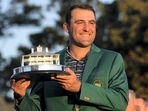 Scottie Scheffler holds the championship trophy after winning the 86th Masters golf tournamenton Sunday, April 10, 2022, in Augusta. Scottie Scheffler holds the championship trophy after winning the 86th Masters golf tournamenton Sunday, April 10, 2022, in Augusta.