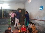 Delhi deputy chief minister, who also holds the education portfolio in the union territory government, interacts with teachers and students during his visit to a school in Gujarat's Bhavnagar. (Twitter/Manish Sisodia)