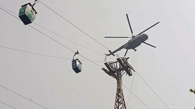 The rescue operation was stopped after dusk due to visibility issues. It will resume on Tuesday morning. (ANI Photo) The rescue operation was stopped after dusk due to visibility issues. It will resume on Tuesday morning. (ANI Photo)