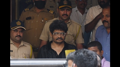 Advocate Gunaratna Sadavarte being taken to Girgaon Court from LT Marg Police Station in Mumbai on April 11 (Bhushan Koyande/HT Photo) Advocate Gunaratna Sadavarte being taken to Girgaon Court from LT Marg Police Station in Mumbai on April 11 (Bhushan Koyande/HT Photo)