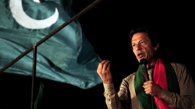 File photo of Imran Khan addressing supporters during an anti-government protest near the prime minister's residence in Islamabad.&nbsp; (AFP)
