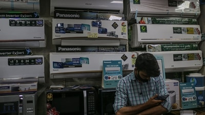 Air conditioners are displayed at a home appliances store in Mumbai, India, on Wednesday, March 2, 2022. (Bloomberg) (Bloomberg) Air conditioners are displayed at a home appliances store in Mumbai, India, on Wednesday, March 2, 2022. (Bloomberg) (Bloomberg)