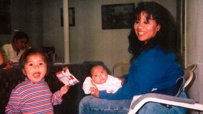 Texas death row inmate Melissa Lucio is holding her daughter Mariah, while one of her other daughters, Adriana, stands next to them. (AP) Texas death row inmate Melissa Lucio is holding her daughter Mariah, while one of her other daughters, Adriana, stands next to them. (AP)