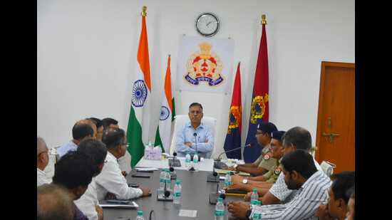 Varanasi commissioner of police Satish Ganesh in a meeting with the office-bearers of the builders’ association. (Sourced)