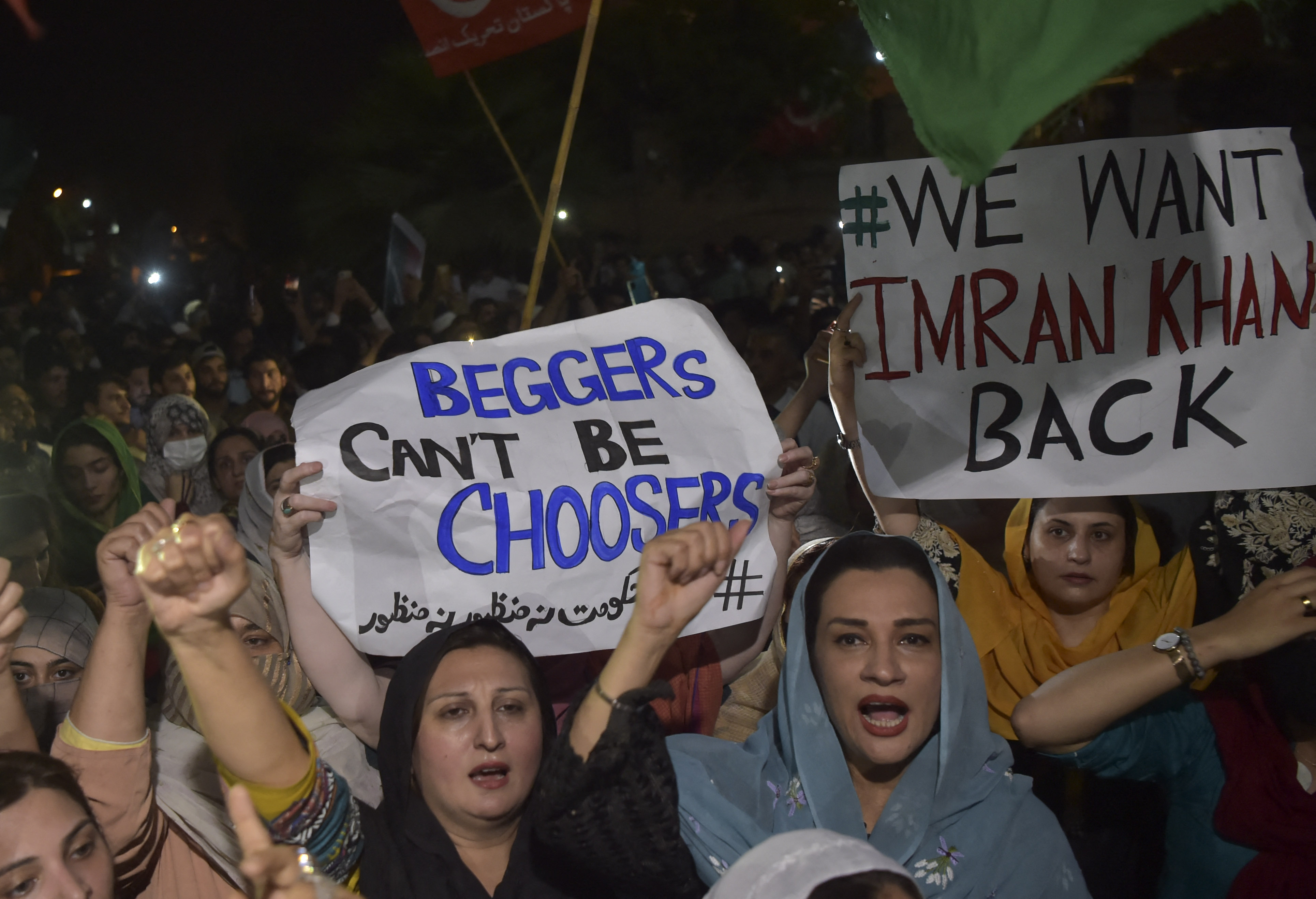 Supporters of Pakistan Tehreek-e-Insaf (PTI) party of dismissed Pakistan's Prime Minister Imran Khan, take part in a rally in his support in Peshawar on April 10, 2022. (AFP) Supporters of Pakistan Tehreek-e-Insaf (PTI) party of dismissed Pakistan's Prime Minister Imran Khan, take part in a rally in his support in Peshawar on April 10, 2022. (AFP)
