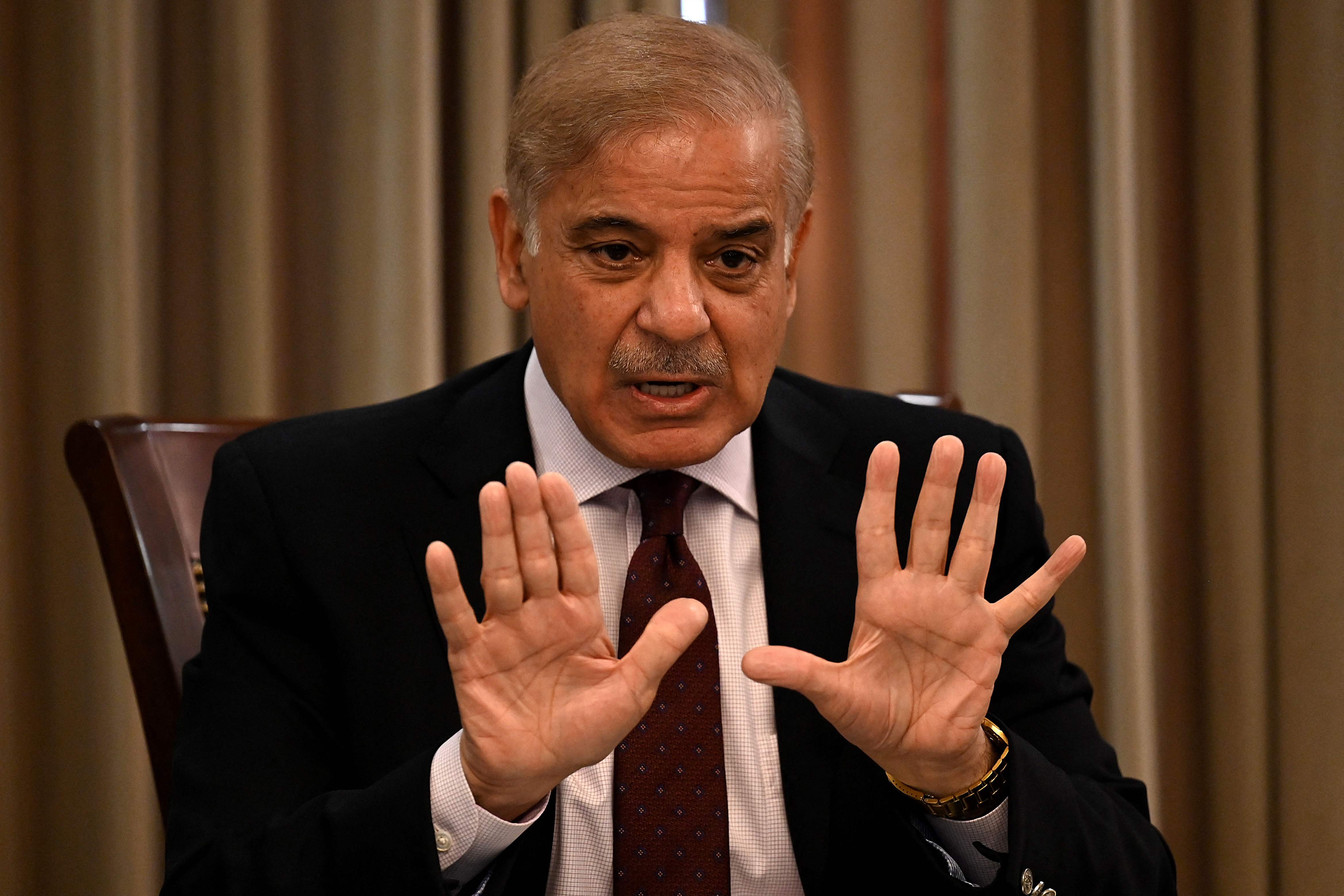 He has taken charge and announced a team of ministers but has at least eight coalition partners and several independents to juggle and please. (AFP) He has taken charge and announced a team of ministers but has at least eight coalition partners and several independents to juggle and please. (AFP)