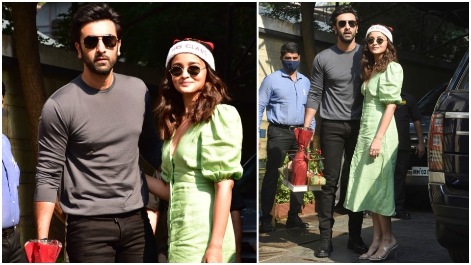 Ranbir and Alia pose for the paparazzi before attending Kapoor clan's Christmas celebrations. Ranbir and Alia pose for the paparazzi before attending Kapoor clan's Christmas celebrations. 