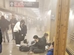 Wounded people lie at the 36th Street subway station after a shooting in New York City.(REUTERS)