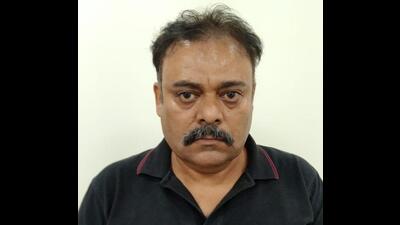 Devinder Kumar Sharma, the accused, is a section officer with GMADA, Mohali. (HT Photo)