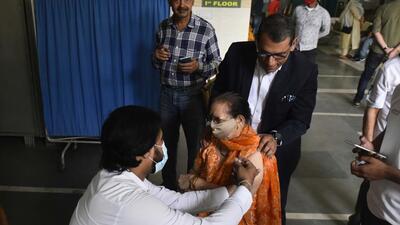 Gurugram, India - April 12, 2022: An elderly person gets inoculated with a booster dose of Covid-19 vaccine, at UPHC PolyClinic, in Sector 31, Gurugram, India, on Tuesday, April 12, 2022. (Photo by Vipin Kumar/ Hindustan Times) (Vipin Kumar/HT PHOTO) Gurugram, India - April 12, 2022: An elderly person gets inoculated with a booster dose of Covid-19 vaccine, at UPHC PolyClinic, in Sector 31, Gurugram, India, on Tuesday, April 12, 2022. (Photo by Vipin Kumar/ Hindustan Times) (Vipin Kumar/HT PHOTO)