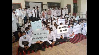 BDS students of IMS BHU sitting on a strike in Varanasi on Tuesday. (HT Photo)