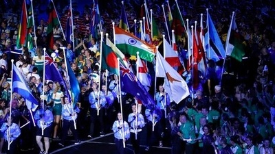 File photo - The flags of participating nations are marched into Carrara Stadium for the closing ceremony of the 2018 Commonwealth Games on the Gold Coast, Australia, April 15, 2018. The Australian state government of Victoria says, Wednesday, Feb. 16, 2022, it has entered into "exclusive negotiations" with the Commonwealth Games Federation to host the 2026 version of the games in regional centers in the state. (AP) File photo - The flags of participating nations are marched into Carrara Stadium for the closing ceremony of the 2018 Commonwealth Games on the Gold Coast, Australia, April 15, 2018. The Australian state government of Victoria says, Wednesday, Feb. 16, 2022, it has entered into "exclusive negotiations" with the Commonwealth Games Federation to host the 2026 version of the games in regional centers in the state. (AP)