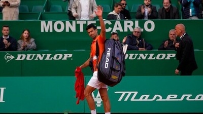 Serbia's Novak Djokovic leaves the court after losing to Spain's Alejandro Davidovich Fokina (AP)