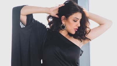 Pregnant Kajal Aggarwal casts a spell in black one-shoulder gown for new maternity shoot: Check out pics here Pregnant Kajal Aggarwal casts a spell in black one-shoulder gown for new maternity shoot: Check out pics here