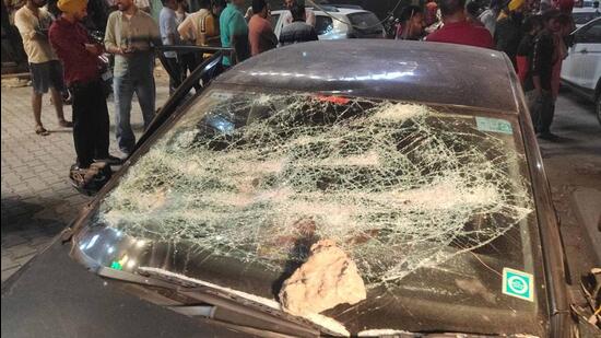 Cars vandalised by the accused at Mata Karamkaur Colony on Tibba Road in Ludhiana on late Monday night. (HT Photo)