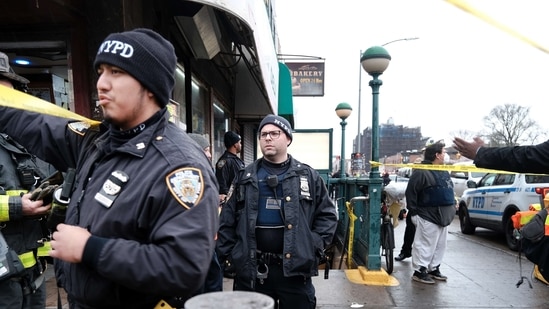 Police and emergency responders gather at the site of a reported shooting of multiple people outside of the 36 St subway station on April 12, 2022 in the Brooklyn borough of New York City.(AFP) Police and emergency responders gather at the site of a reported shooting of multiple people outside of the 36 St subway station on April 12, 2022 in the Brooklyn borough of New York City.