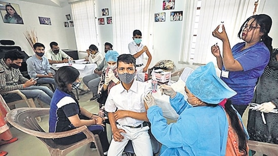 A student receives a dose of Covid-19 vaccine. (ANI)