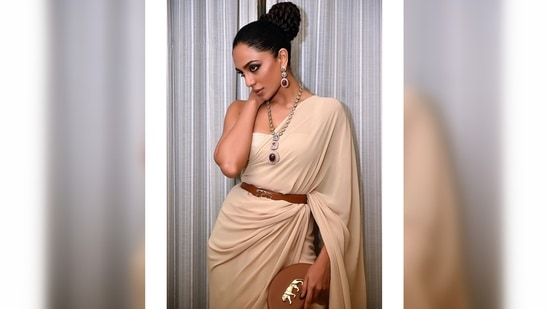 Sobhita Dhulipala teamed her look with a sleeveless corset-inspired blouse and a tan waist belt from the designer's collection.(Instagram/@sobhitad)