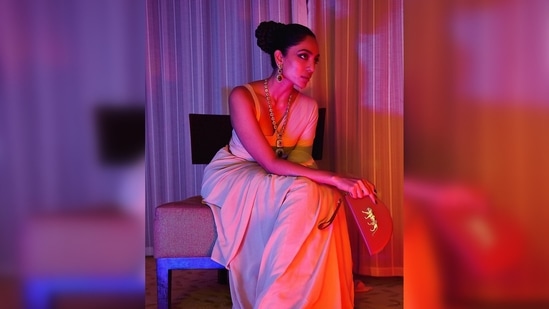 With smokey eyes and nude lips, Sobhita Dhulipala tied her hair up in a sleek neat bun.(Instagram/@sobhitad)