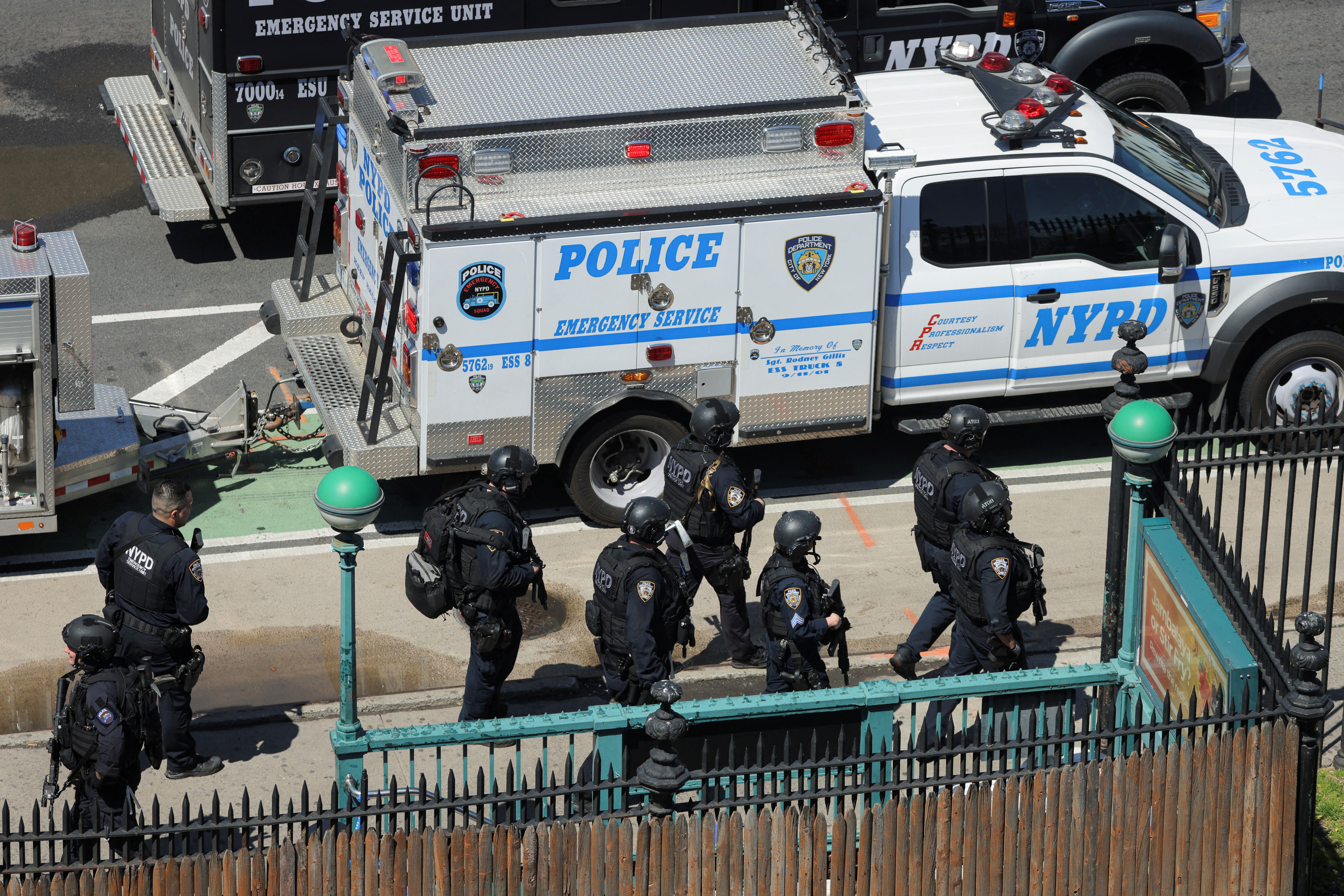 New York City Police Department (NYPD) officers leave a subway station, the scene of a shooting, in the Brooklyn borough on April 12, 2022.&nbsp; (REUTERS)