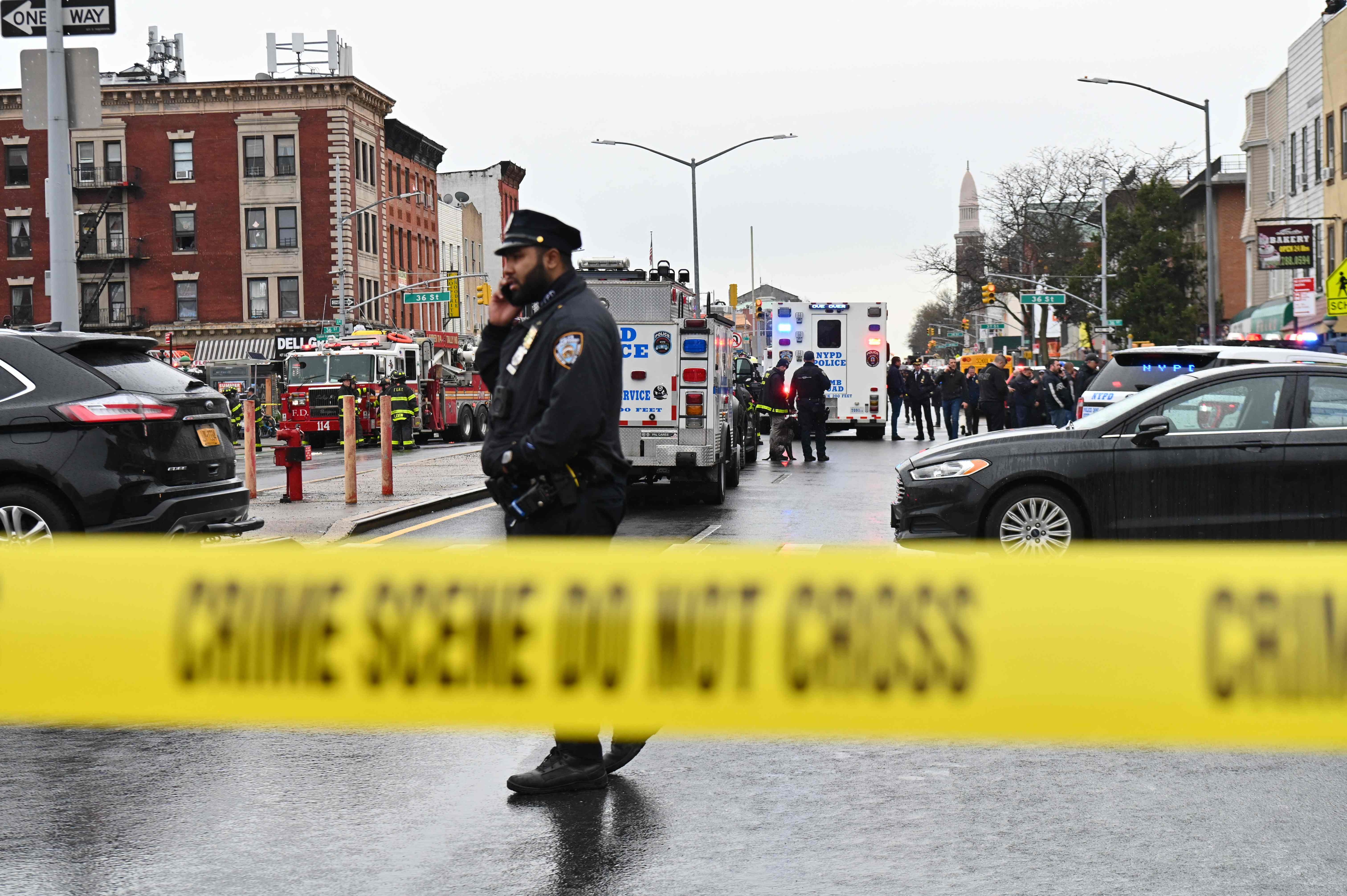 Members of the New York Police Department and emergency vehicles crowd the streets after at least 13 people were injured during a rush-hour shooting at a subway station in the New York borough of Brooklyn. (AFP) Members of the New York Police Department and emergency vehicles crowd the streets after at least 13 people were injured during a rush-hour shooting at a subway station in the New York borough of Brooklyn. (AFP)